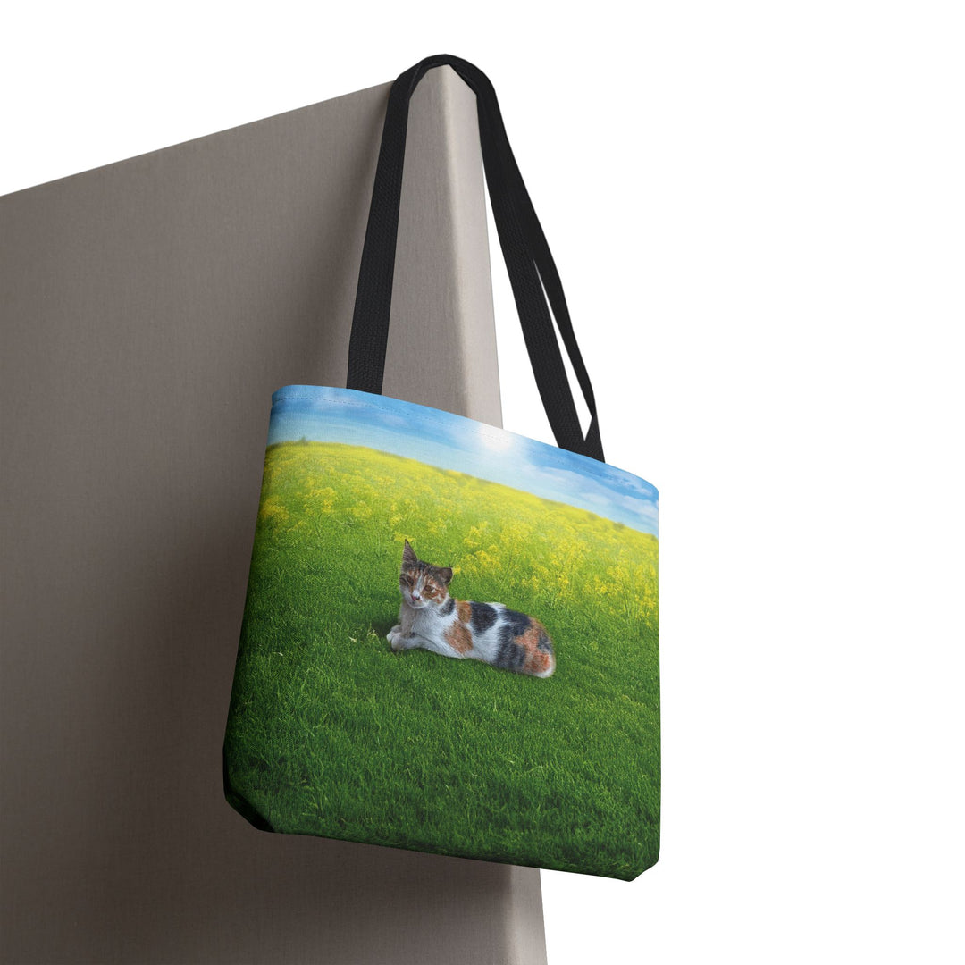 Cat Lying on Fresh Grass Tote Bag