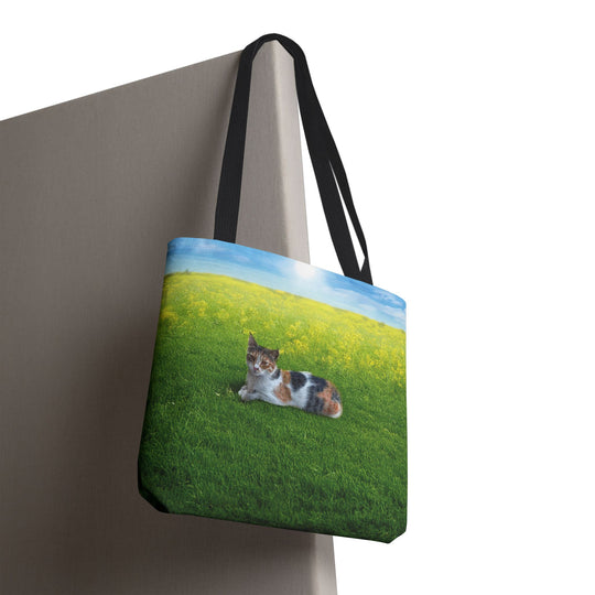 Cat Lying on Fresh Grass Tote Bag
